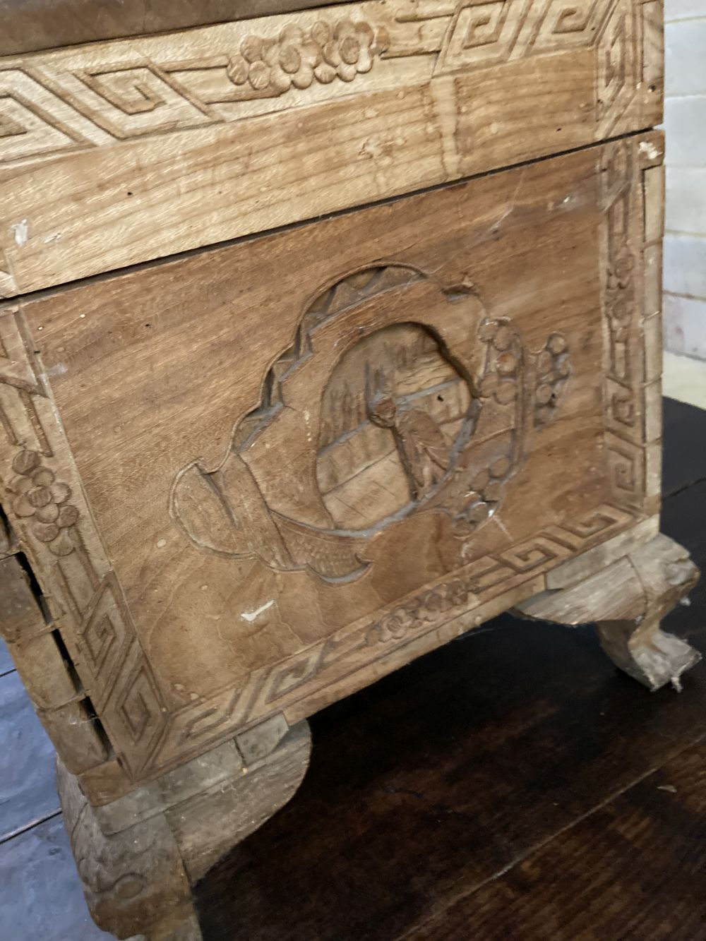 A Chinese carved camphorwood trunk, width 92cm depth 48cm height 51cm